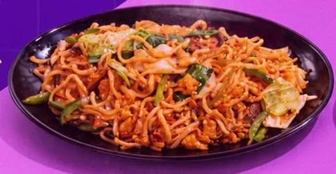 A plate of stir fried hawker noodles.