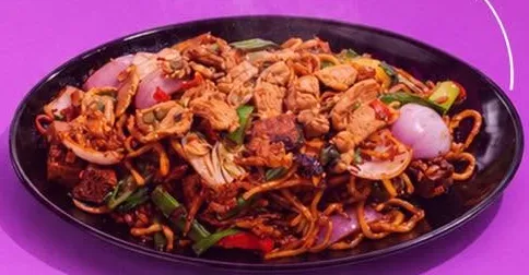 A plate of mee goreng noodles.